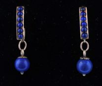 A pair of 15ct gold and lapis lazuli drop earrings. The earrings having a studded bar with