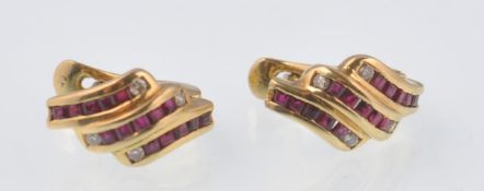 PAIR OF18CT GOLD RUBY AND DIAMOND LADIES CHANNEL SET EARRINGS