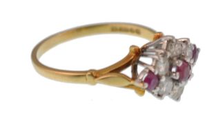 AN 18CT GOLD LADIES RUBY AND DIAMOND CLUSTER RING
