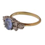 18CT / 750 MARKED BLUE SAPPHIRE AND DIAMOND LADIES RING