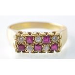 18CT GOLD RUBY AND DIAMOND PAVE SET LADIES RING