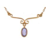 An early 20th Century Edwardian 18ct gold and sapphire pendant necklace. The necklace having a fixed