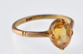 A vintage 9ct gold and oval citrine single stone ring. Stamped 9ct. Weight 2.2g