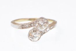 18CT GOLD PLATINUM AND DIAMOND CROSSOVER SETTING RING