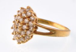 A continental gold and Cubic Zirconia ring. Weight 3.4g, likely 14ct untested
