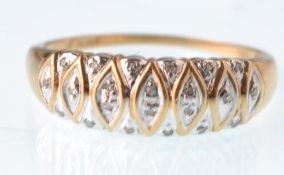A modern 9ct gold and tiny diamond tapering banding post,  2000 hallmarks. Weight 2.6g