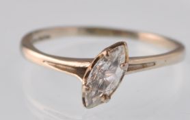 A modern 14ct gold marquise diamond solitaire ring in an off-set claw mount on a d-section shank