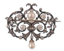 A French 18ct gold diamond and pearl Belle Époque brooch. The brooch having rose an old cut diamonds