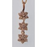 AN 18CT GOLD AND DIAMOND LADIES NECKLACE PENDANT AND CHAIN