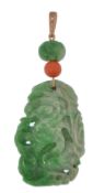A Chinese gold jade and diamond necklace pendant. The pendant formed of carved jade depicting