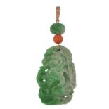 A Chinese gold jade and diamond necklace pendant. The pendant formed of carved jade depicting