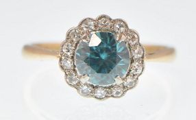 18CT GOLD BLUE ZIRCON AND DIAMOND CLUSTER RING