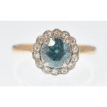 18CT GOLD BLUE ZIRCON AND DIAMOND CLUSTER RING