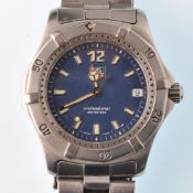 A Vintage Tag Heuer gentleman's stainless steel wristwatch. The blue dial with luminous baton