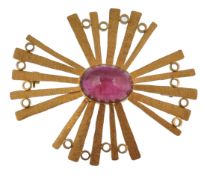 A hallmarked 18ct gold and tourmaline modernist brooch by Thomas A Payne C.P. Triggs. The brooch set