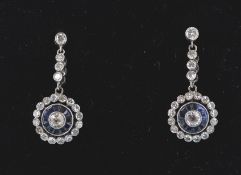 A pair 14ct gold Art Deco style sapphire and diamond drop cluster earrings. The earrings having