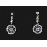 A pair 14ct gold Art Deco style sapphire and diamond drop cluster earrings. The earrings having