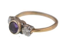 AN 18CT GOLD AMETHYST AND DIAMOND 3 STONE LADIES RING