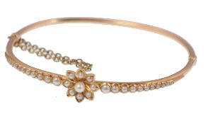 19TH CENTURY FRENCH GOLD AND PEARL FLOWER HEAD BRACELET