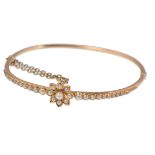 19TH CENTURY FRENCH GOLD AND PEARL FLOWER HEAD BRACELET