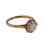 AN 18CT GOLD AND OPAL DIAMOND LADIES RING