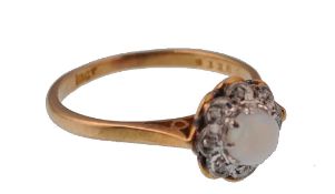 AN 18CT GOLD AND OPAL DIAMOND LADIES RING