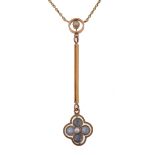 An Art Nouveau 15ct gold and sapphire pearl pendant necklace.  The pendant having a cluster of