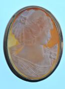 A modern 9ct gold mounted oval shell cameo depicting a young female maiden. Birmingham hallmarks for