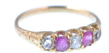 AN 18CT GOLD RUBY AND DIAMOND LADIES 5 STONE RING