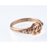 An early 20th century 9ct rose gold knot ring. Marks indistinct, circa 1910 Edwardian. 2.1g
