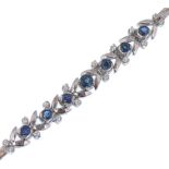 A French white gold sapphire and diamond bracelet. The bracelet set with sapphire and diamond