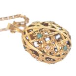 IGOR CARL FOR HOUSE OF FABERGE 14CT GOLD DIAMOND AND EMERALD EGG PENDANT ON CHAIN