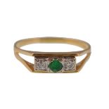 AN 18CT GOLD EMERALD AND DIAMOND LADIES 3 STONE RING