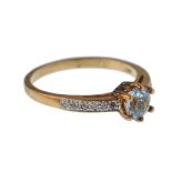 9CT GOLD SINGLE STONE AQUAMARINE & LADIES DIAMOND RING