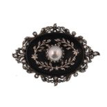 An early 20th century French 18ct gold, silver onyx diamond and pearl brooch pin. The brooch