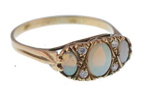 A 9CT GOLD / 375 HALLMARKED OPAL LADIES 3 STONE GYPSY RING