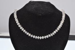 A vintage aquamarine beryl bead necklace.  The necklace strung with faceted aquamarine beads of