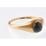 An early 20th century gold  and bloodstone cabochon gypsy ring being stamped 18ct to the inner