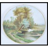 A 20th century hand painted wall charger plate, po