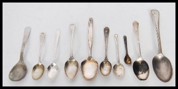 A collection of 10 spoons and tea spoons  to inclu