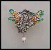 A stamped 925 silver brooch in the form of a fairy