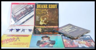 A collection of vinyl long play LP records to incl