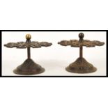 A pair of 19th Century Victorian cast metal stamp