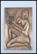 A 20th Century wall hanging bronzed plaque depicti