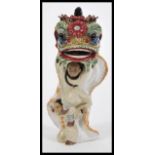 An unusual 20th Century Chinese pottery figurine d