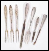 A selection of silver items to include a manicure