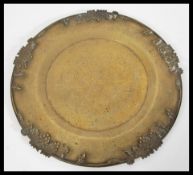 A 19th Century Chinese bronze charger plate having