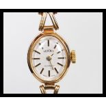 A hallmarked 9ct gold ladies Gradus wrist watch ha