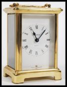 A Bayard French carriage clock with white enamel d