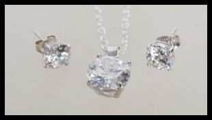 A stamped 925 silver necklace with a prong set cz